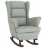 Sillón mecedora patas madera y taburete terciopelo gris