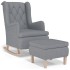 Sillón con patas mecedoras y taburete de tela gris