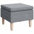 Sillón con patas mecedoras y taburete de tela gris