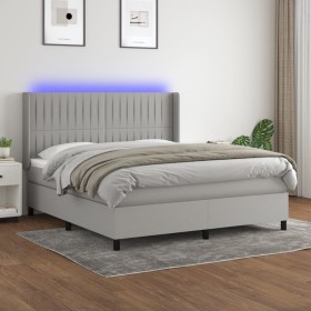 Cama box spring colchón y luces LED tela gris claro 160x200