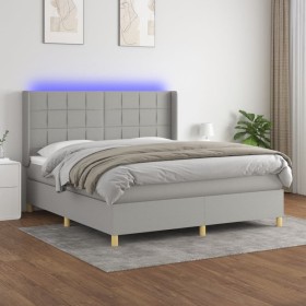 Cama box spring colchón y luces LED tela gris claro 160x200