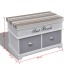 Banco baúl de madera y cojin gris, con