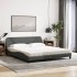 Cama con colchón de tela gris oscuro 180x200