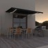 Toldo retráctil manual con luz LED gris antracita 500x350